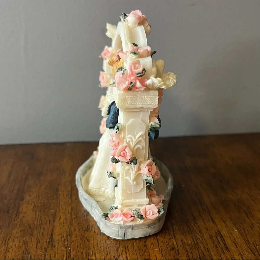 Vintage wedding cake topper. Romantic Wedding Couple Figurine with Pink Roses
